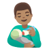 man feeding baby, medium skin tone